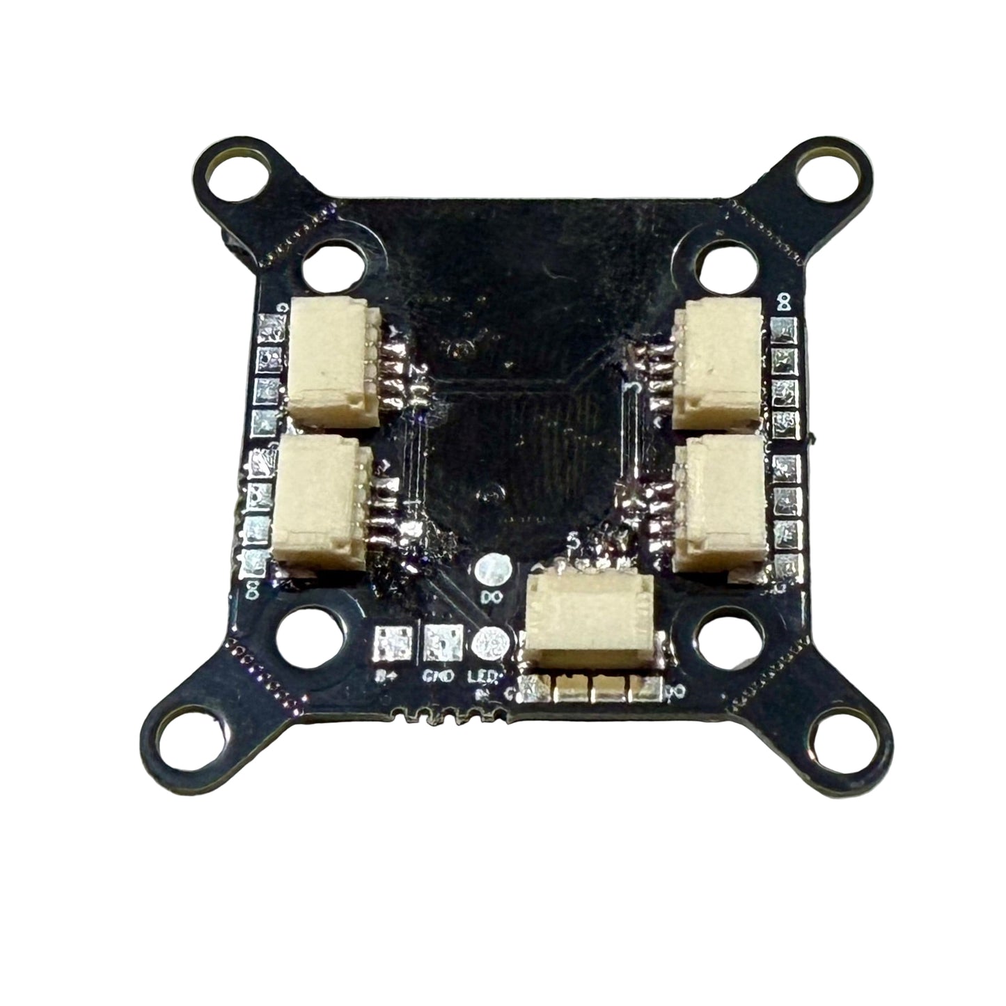 Electronic circuit board with components on a gray grid background